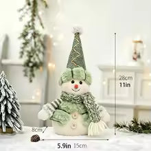 Estatuetas de bonecos de neve verdes para o Natal, decoração de cenas natalinas e enfeites de bonecos que realçam o ambiente, disponíveis em vários estilos, incluindo renas, bonecos de neve e designs de snowboard/esqui, adequados para decorações de férias, vitrines de shoppings e hotéis.